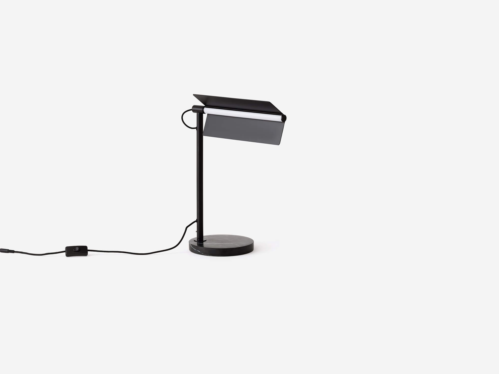 Angled view of the Oxford side table lamp in black with shade angled up